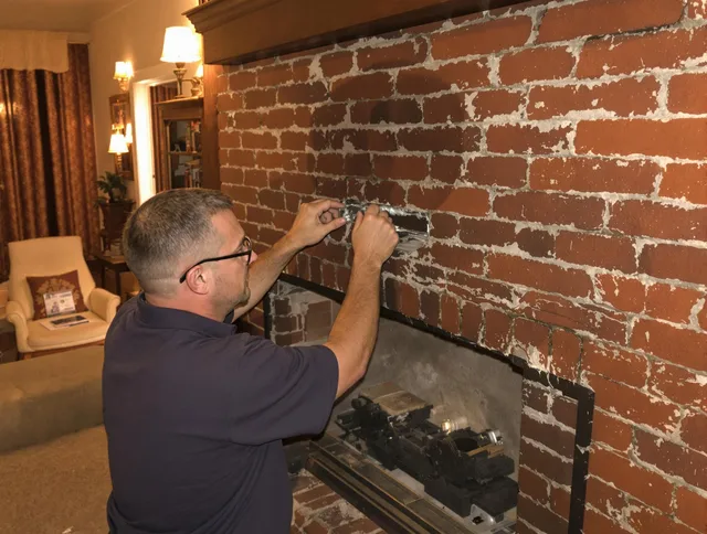 Temple City Chimney Sweep expert fixing a fireplace in Temple City, CA